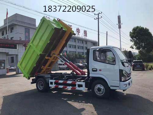 國六東風(fēng)多利卡勾臂式垃圾車批量下線銷售_新中綠專汽